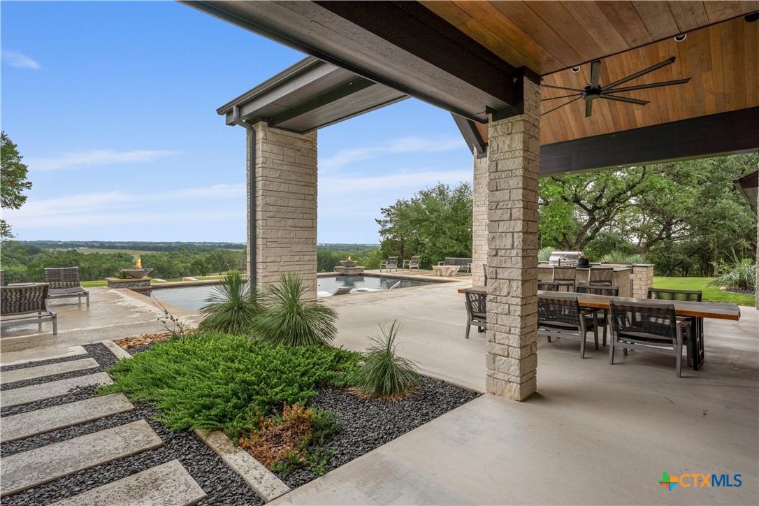 19102 Post Oak Road Bartlett, TX 76511 - Photo 37 of 43 a view of a patio with chairs and table of the patio
