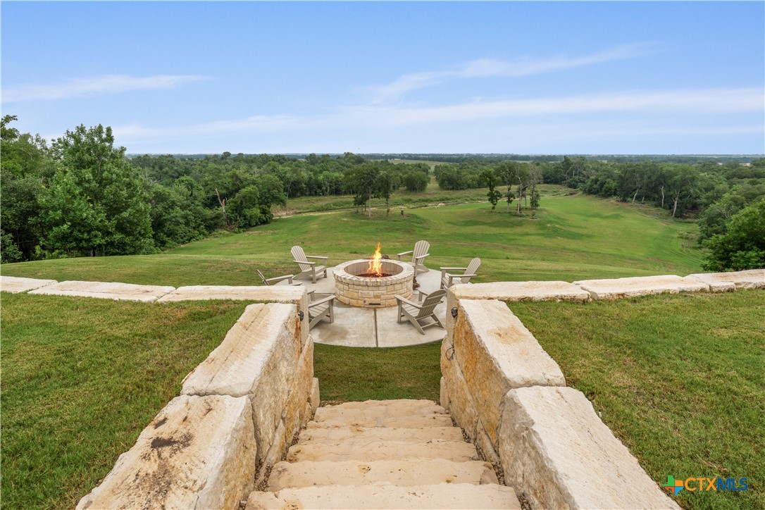 19102 Post Oak Road Bartlett, TX 76511 - Photo 42 of 43 a view of a lake with a garden