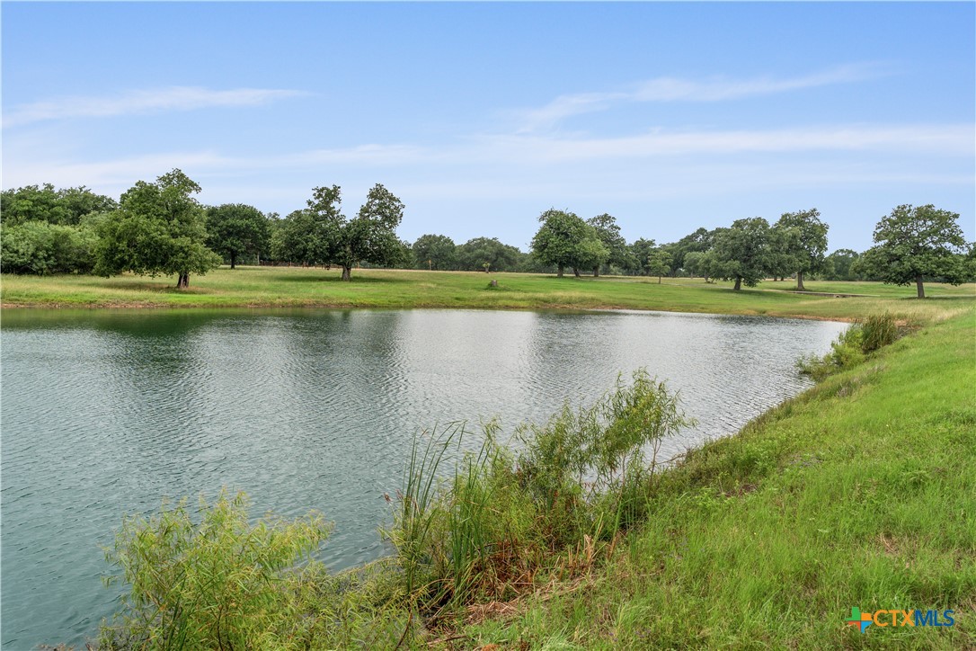19102 Post Oak Road Bartlett, TX 76511 - Photo 43 of 43 a view of a lake with a city view