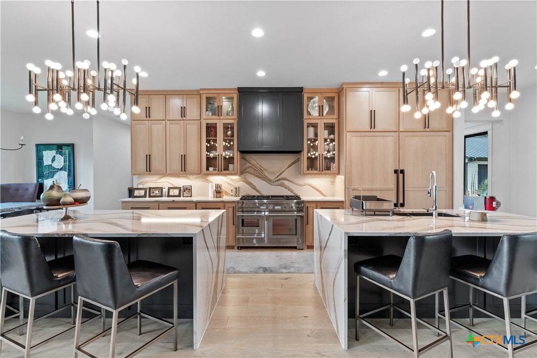 19102 Post Oak Road Bartlett, TX 76511 - Photo 10 of 43 a view of a dining room with furniture and chandelier