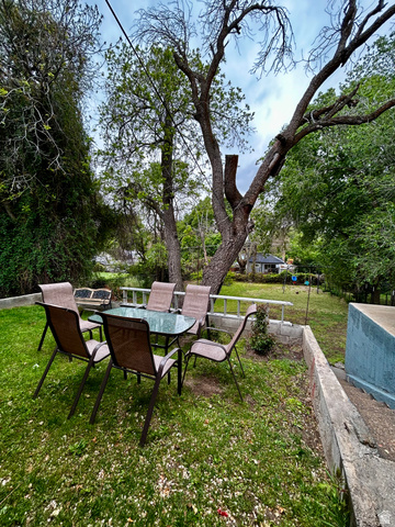1931 Harrison Boulevard Ogden, UT 84401 - Photo 17 of 21 Grassy outdoor area featuring mature trees and concrete retaining walls