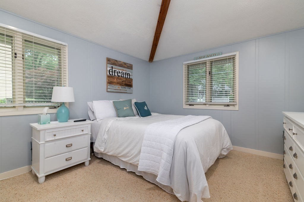 233 Hooppole Road Mashpee, MA 02649 - Photo 12 of 41 a bedroom with a bed and a window