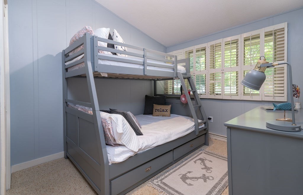 233 Hooppole Road Mashpee, MA 02649 - Photo 13 of 41 a bedroom with furniture and a window