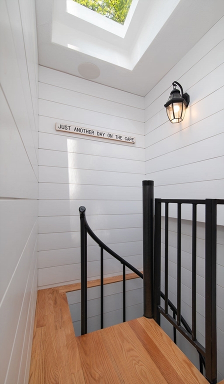 233 Hooppole Road Mashpee, MA 02649 - Photo 14 of 41 a view of staircase with railing and white walls