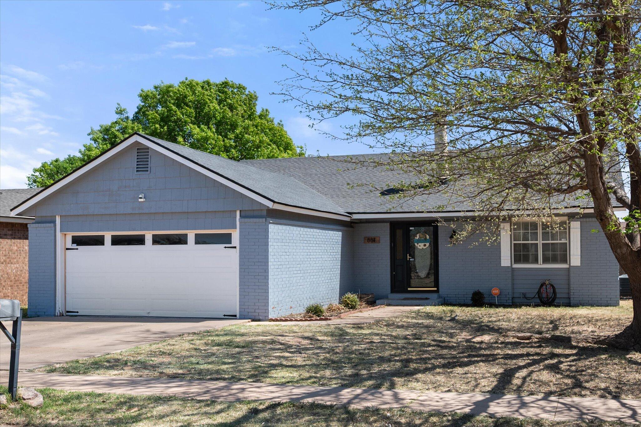 8811 Flint Avenue Lubbock, TX 79423 - Photo 2 of 30 23-8811 Flint_9064_crop