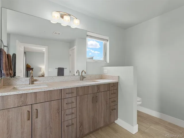 a view of a chairs and table in a patio