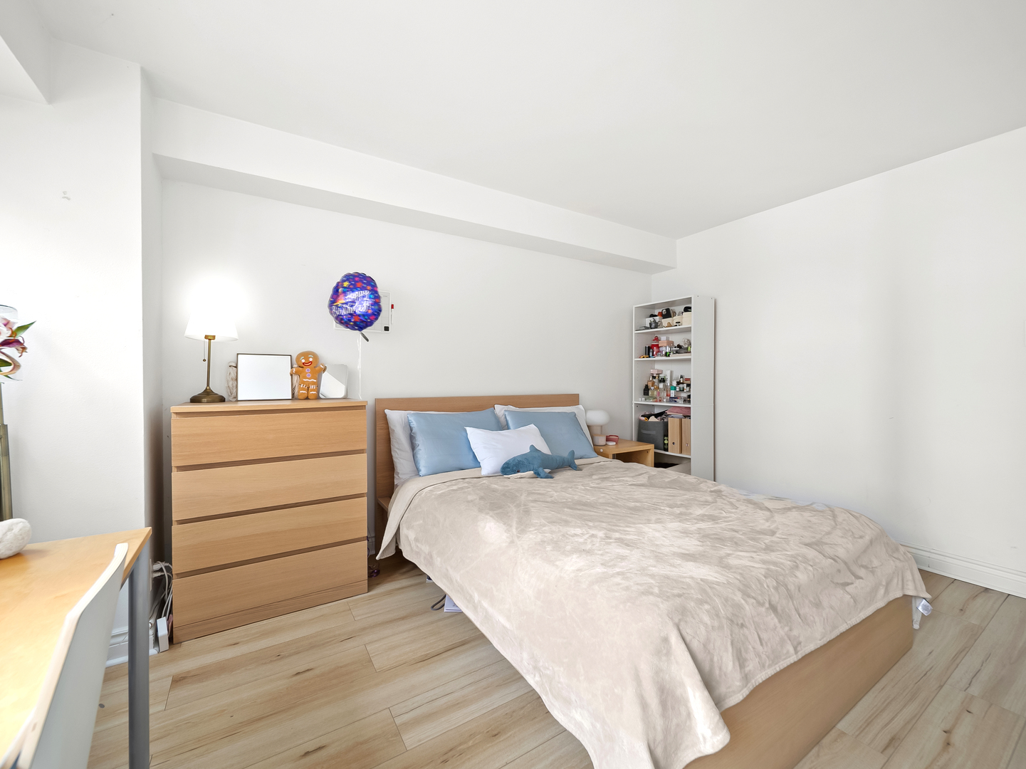 6118 North Sheridan Road, Unit 1008 Chicago, IL 60660 - Photo 12 of 19 a bedroom with a bed and a cabinets