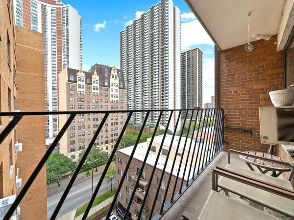 a view of a balcony with window