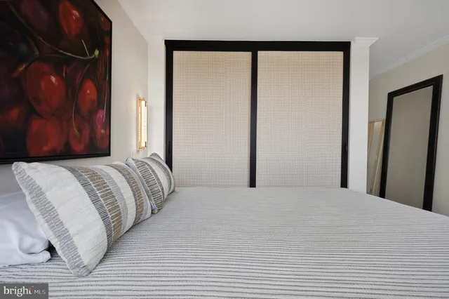 a roof deck with a table and chairs