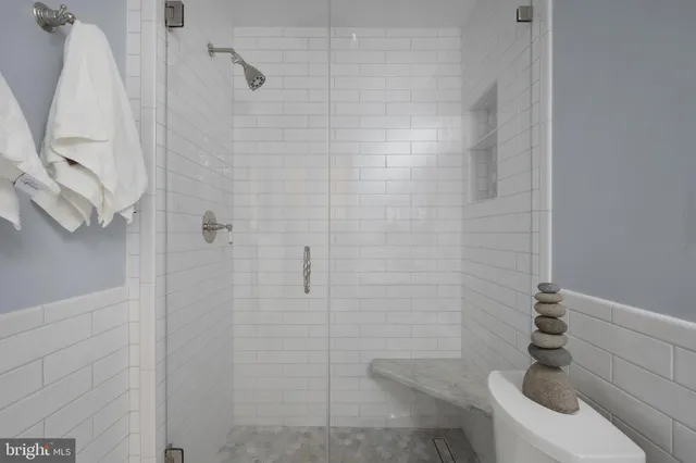 a front view of a building with garden