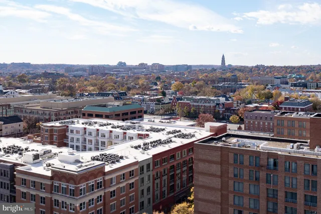 a black and white building view with a glass door