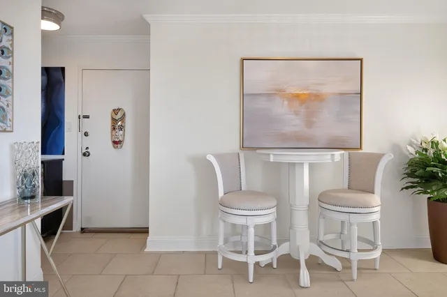 a room with furniture and a mirror