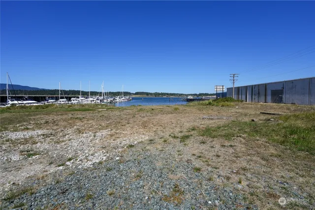 a view of a swimming pool with outdoor seating