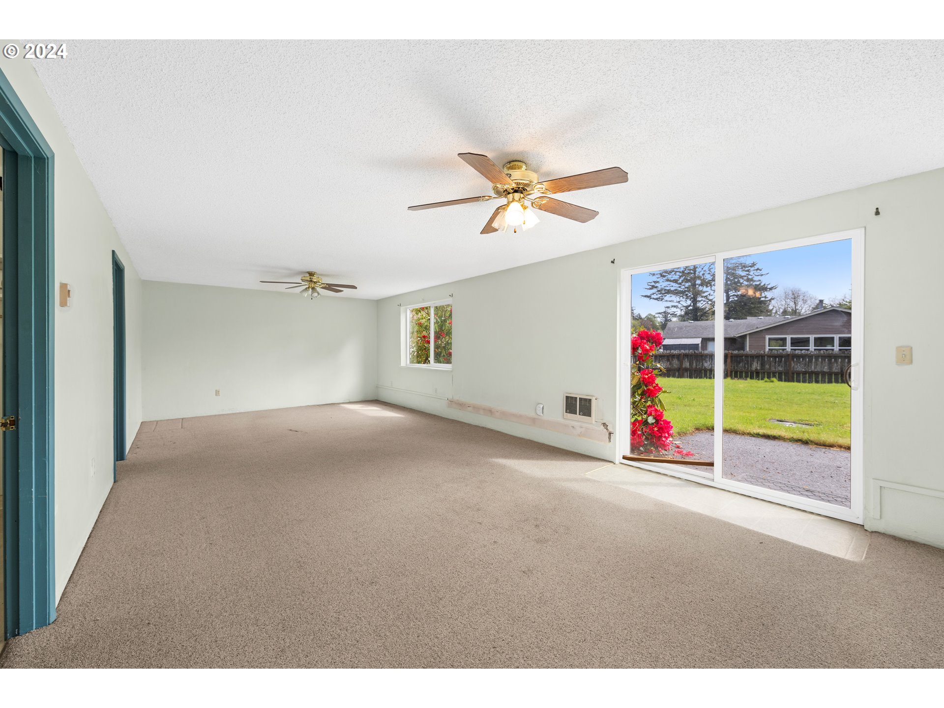 91897 Ridge Road Warrenton, OR 97146 - Photo 18 of 24 a view of an empty room with a ceiling fan