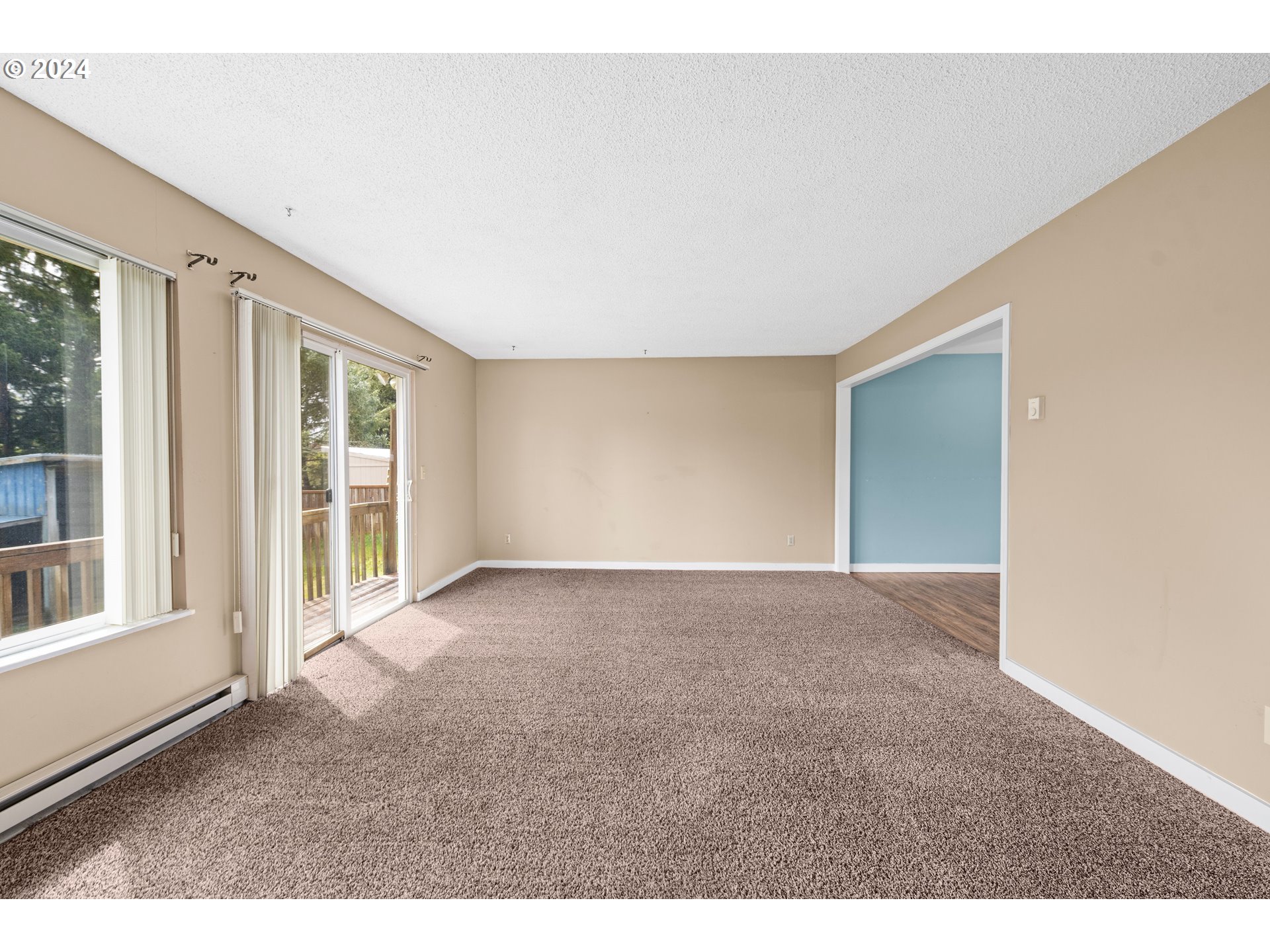 91897 Ridge Road Warrenton, OR 97146 - Photo 10 of 24 a view of an empty room with a window