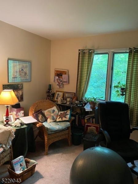 39 Patriots Road Morris Plains, NJ 07950 - Photo 13 of 14 a living room with furniture and a large window