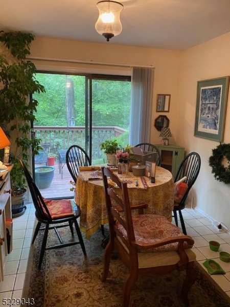 39 Patriots Road Morris Plains, NJ 07950 - Photo 3 of 14 a outdoor dining space with furniture and outdoor view