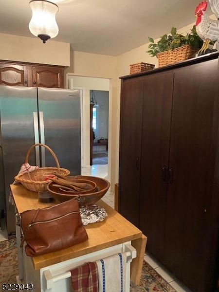 39 Patriots Road Morris Plains, NJ 07950 - Photo 7 of 14 a bed sitting in a bedroom next to a bathroom