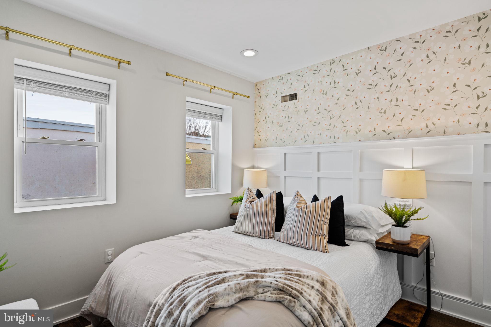 1629 South Camac Street Philadelphia, PA 19148 - Photo 24 of 34 a bedroom with bed and window