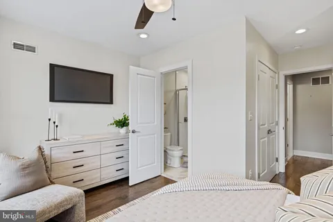 a bathroom with a shower and a sink