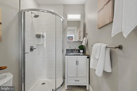 an empty room with white walls and white walls