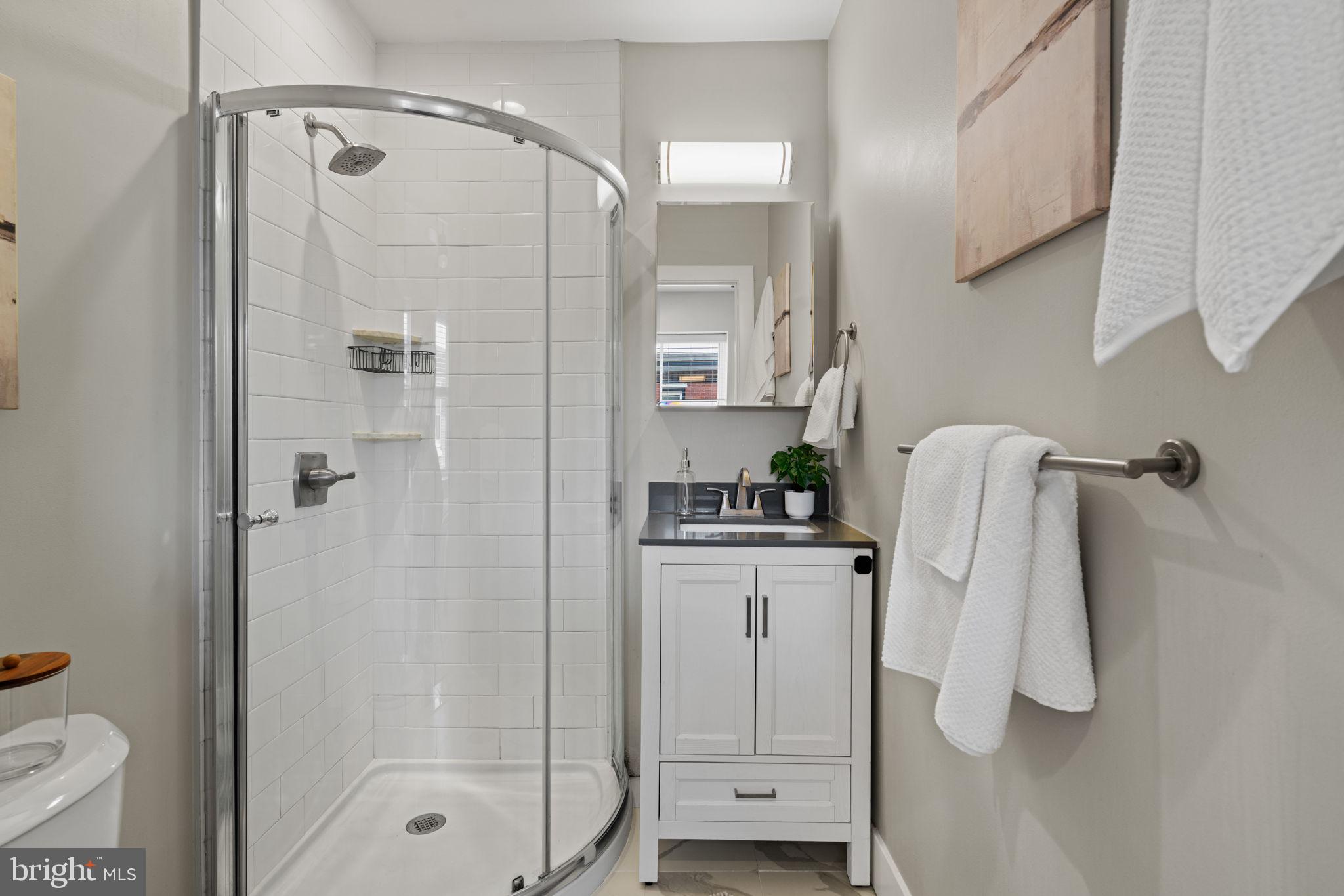 1629 South Camac Street Philadelphia, PA 19148 - Photo 30 of 34 a bathroom with a shower and a sink