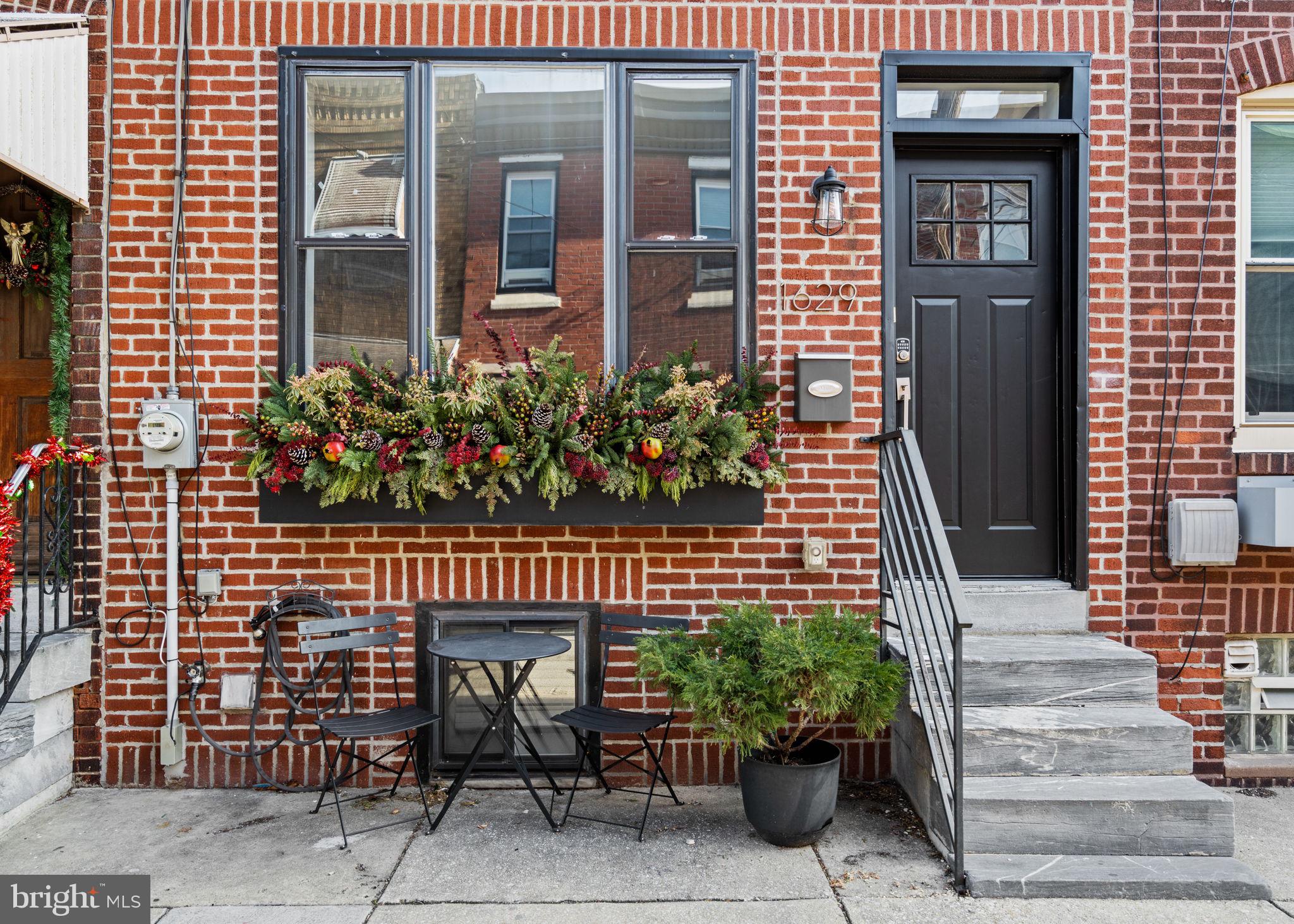 1629 South Camac Street Philadelphia, PA 19148 - Photo 3 of 34 a front view of a house