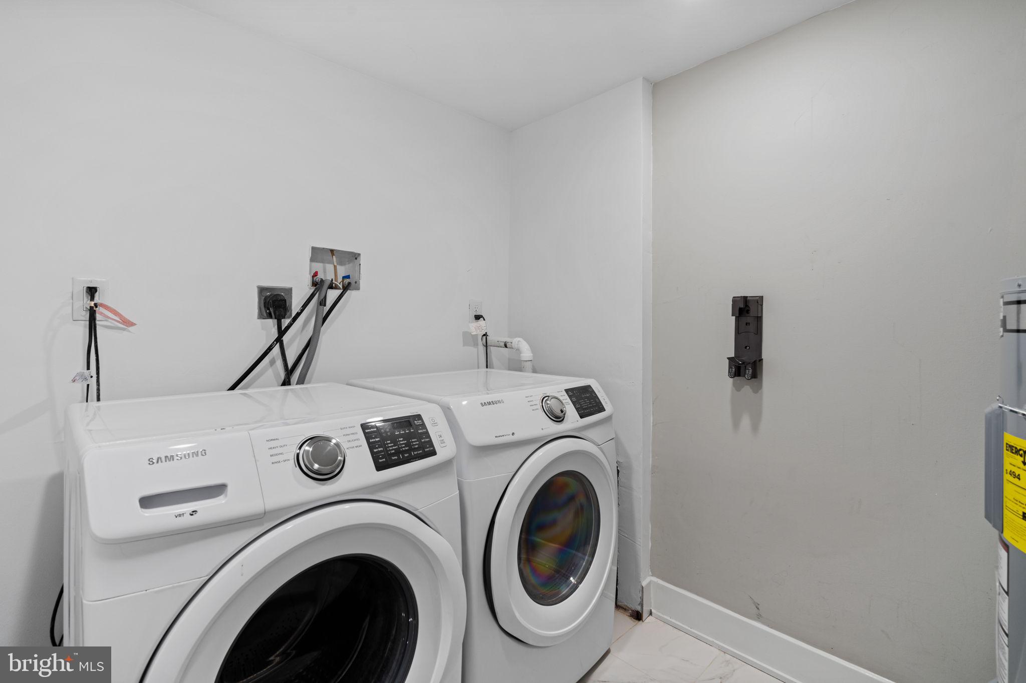 1629 South Camac Street Philadelphia, PA 19148 - Photo 33 of 34 a utility room with dryer and washer