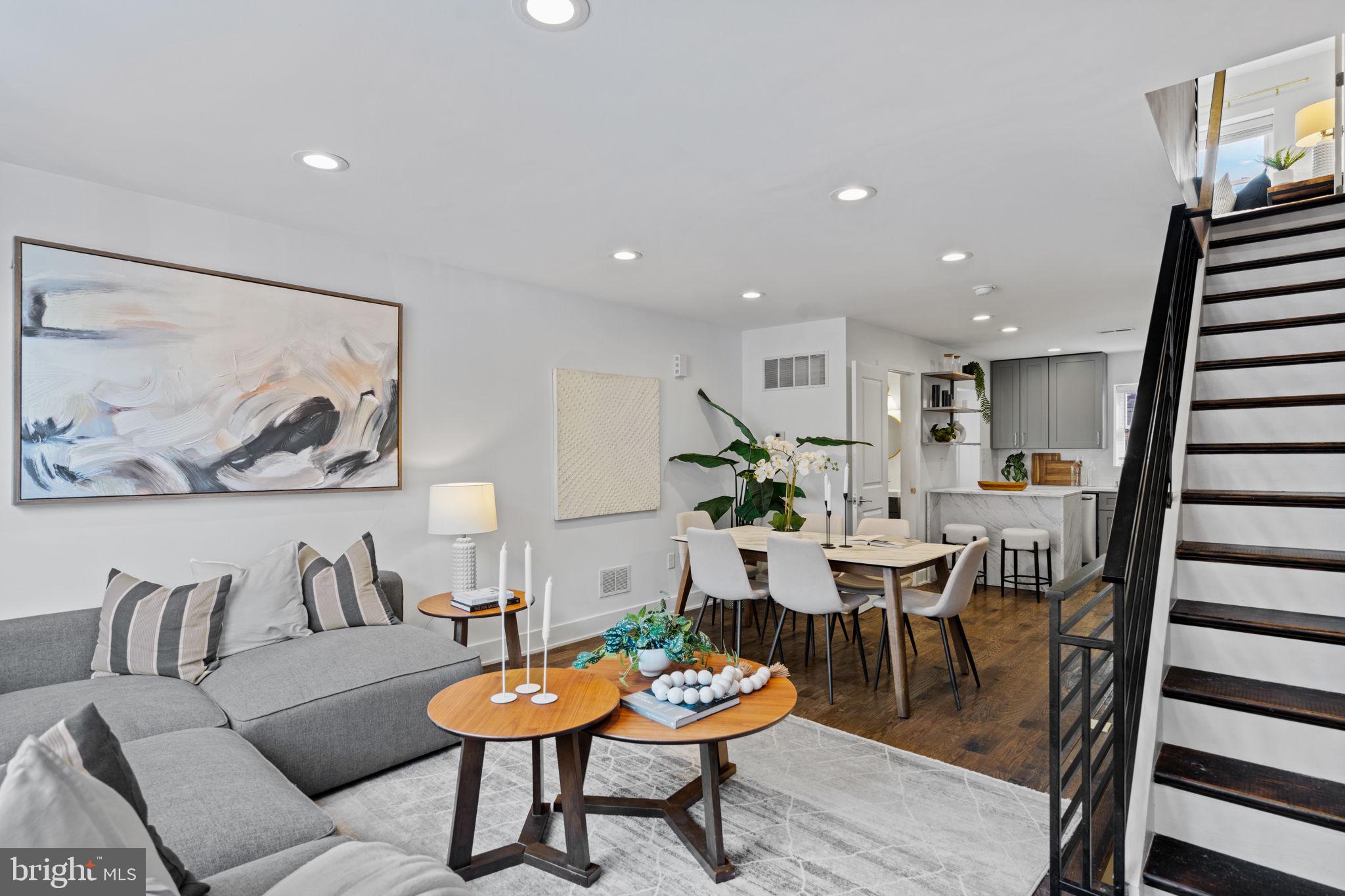 1629 South Camac Street Philadelphia, PA 19148 - Photo 7 of 34 a living room with furniture and wooden floor