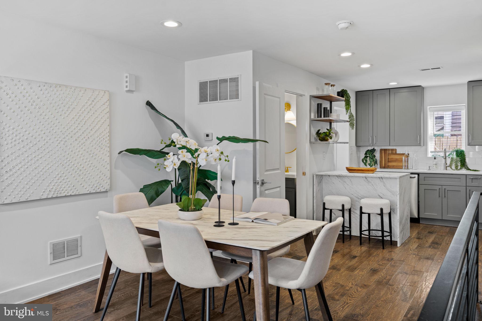 1629 South Camac Street Philadelphia, PA 19148 - Photo 9 of 34 a view of a dining room with furniture and wooden floor