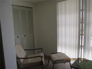 a room with a table and a chair