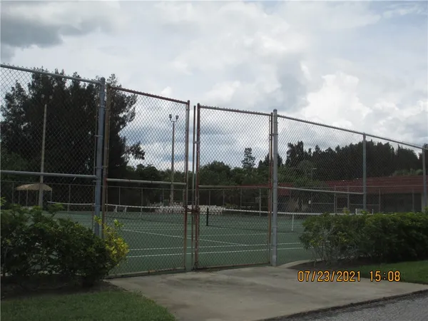 a view of a fence and a window