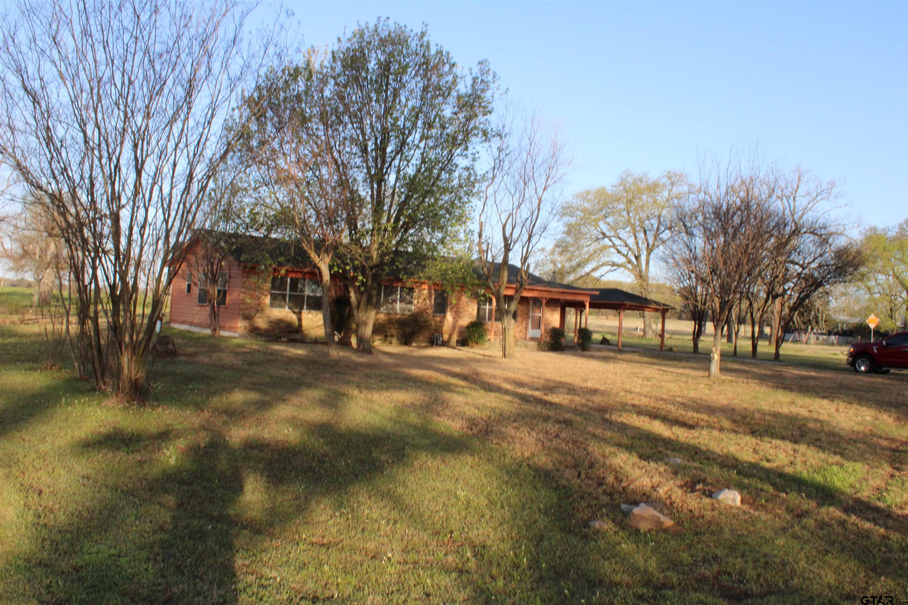137 North Main Street Yantis, TX 75497 - Photo 2 of 22 a view of road with trees