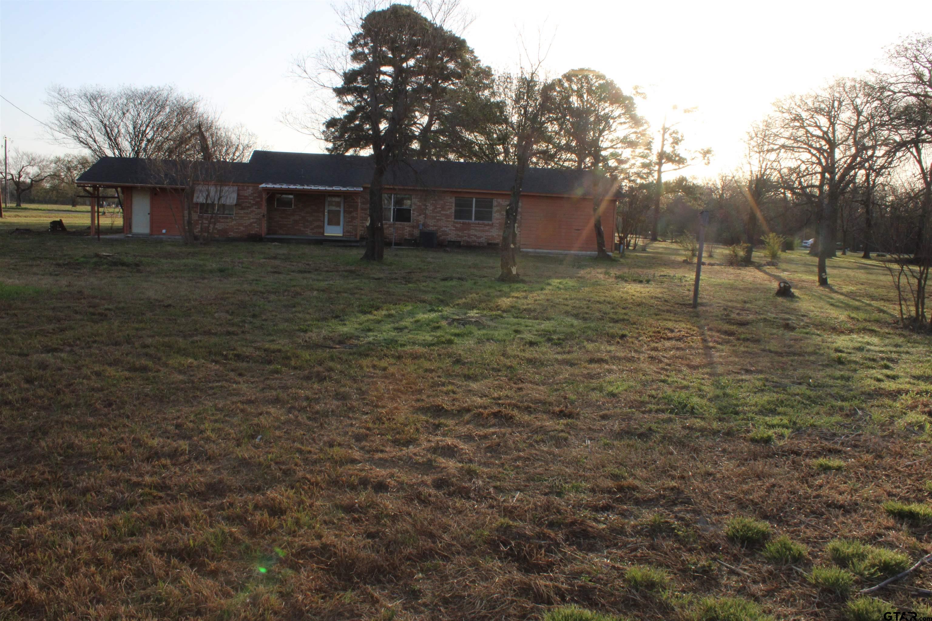 137 North Main Street Yantis, TX 75497 - Photo 22 of 22 a view of a house with a yard