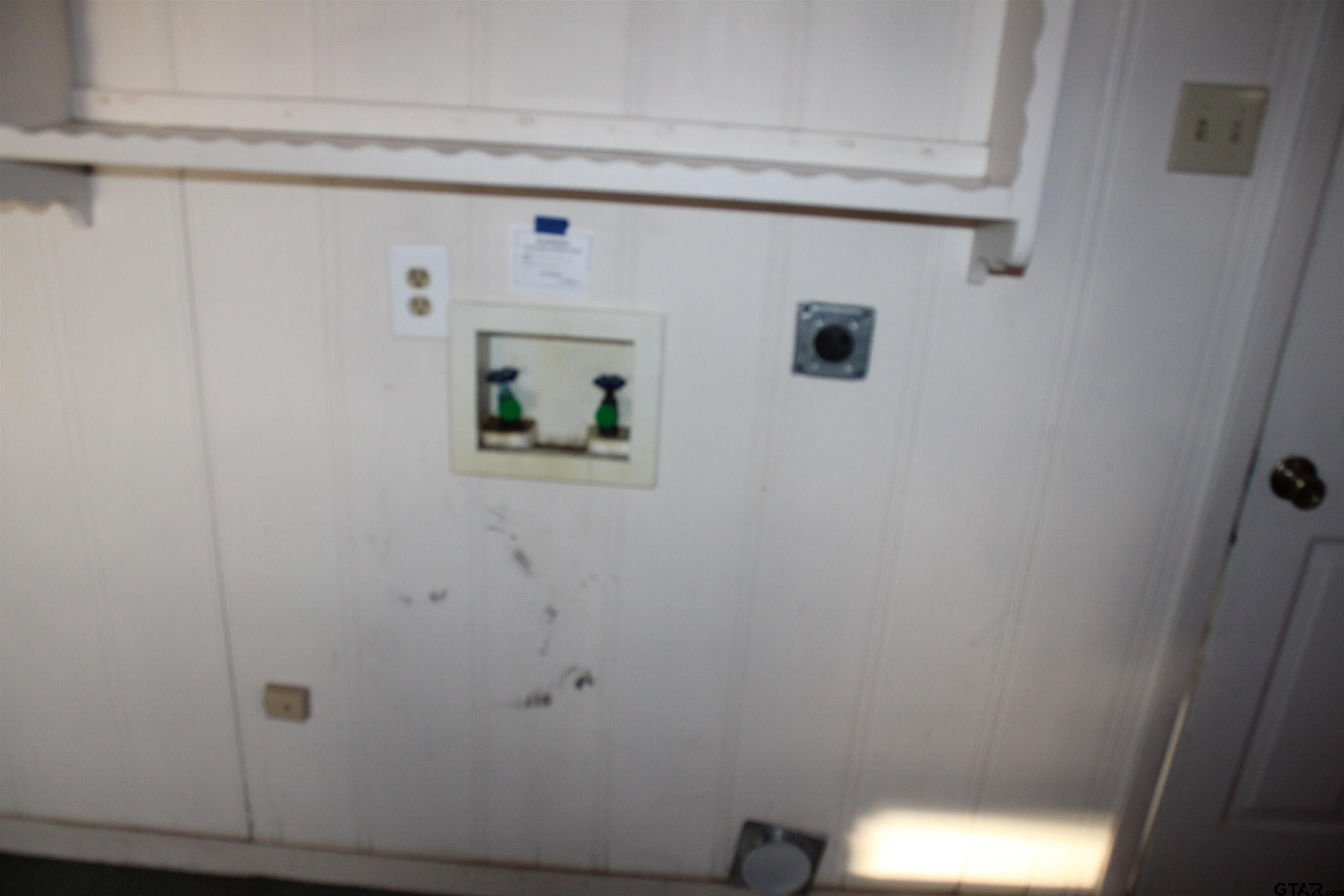 137 North Main Street Yantis, TX 75497 - Photo 5 of 22 a bathroom with a shower and a toilet