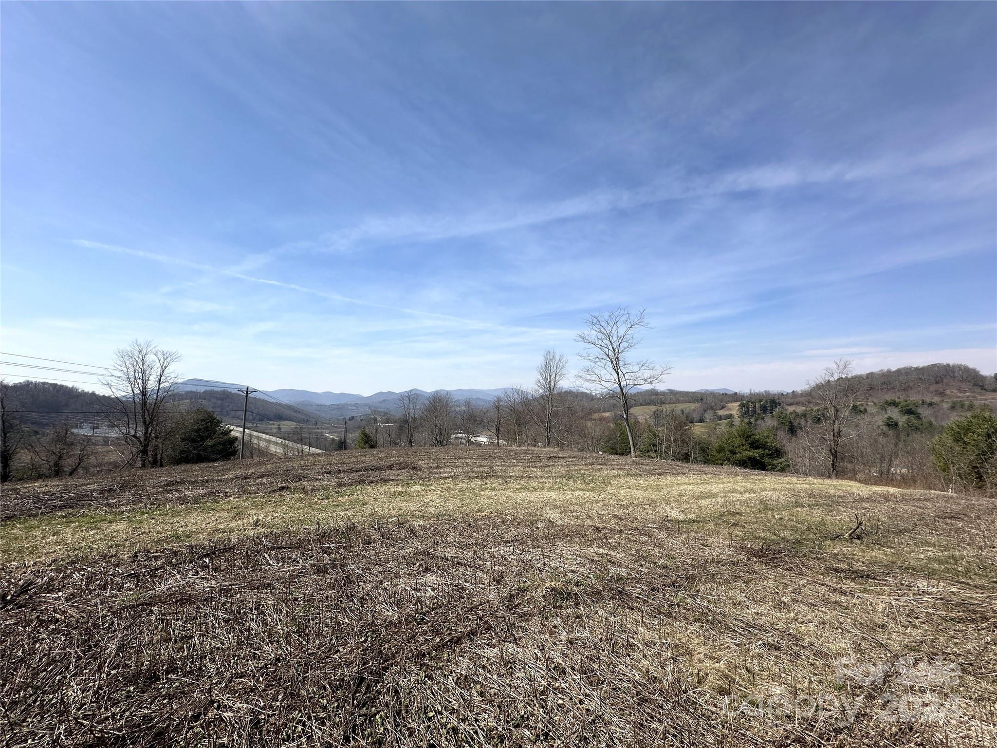 421 US Highway 421 None, Unit NONE Boone, NC 28607 - Photo 21 of 27 a view of a field with a tree in the background