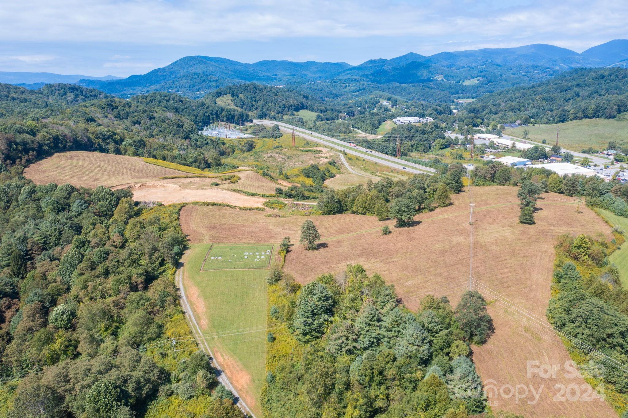 421 US Highway 421 None, Unit NONE Boone, NC 28607 - Photo 5 of 27 an aerial view of a house with a lake view