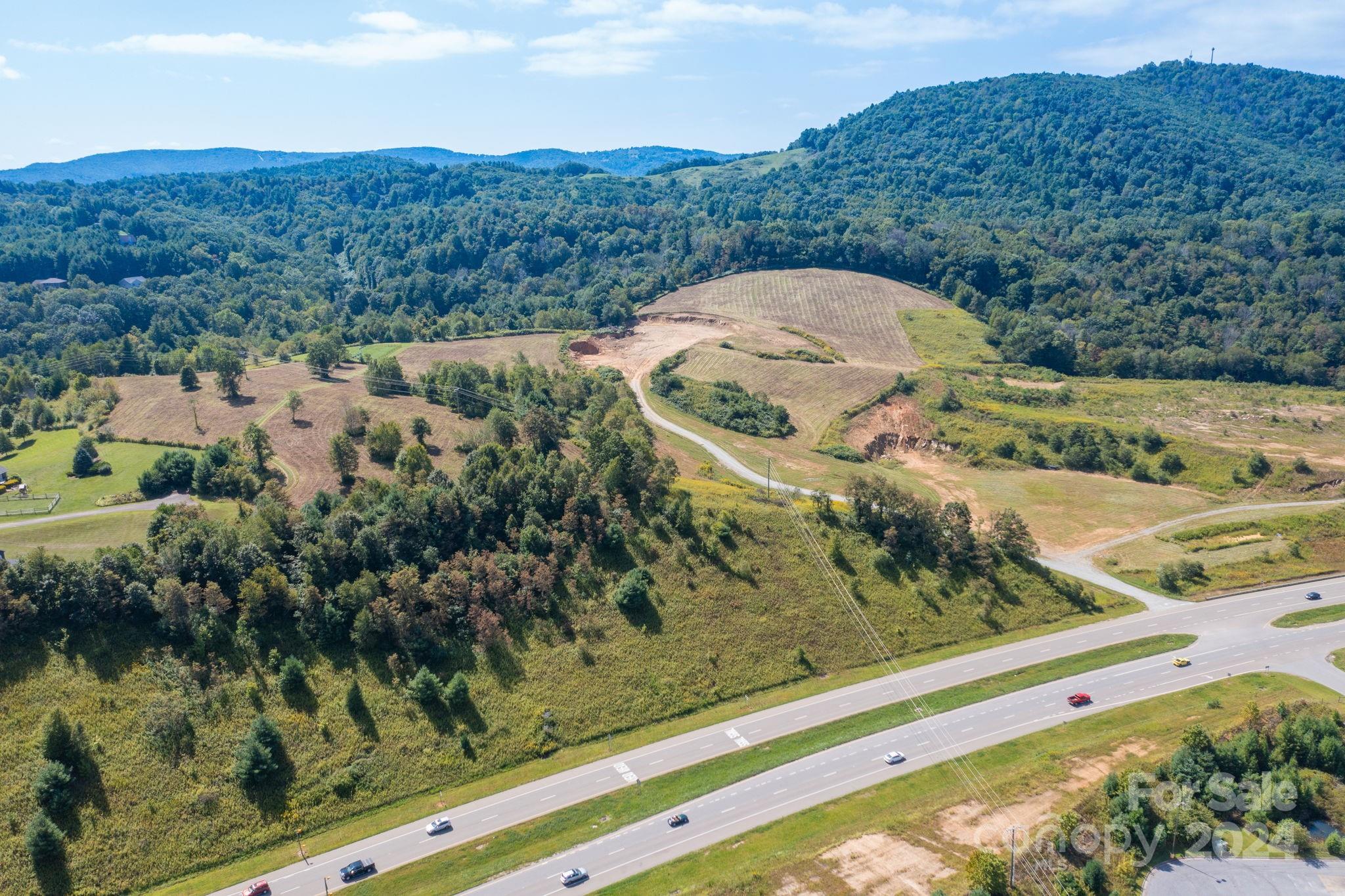 421 US Highway 421 None, Unit NONE Boone, NC 28607 - Photo 8 of 27 a view of a mountain from a balcony