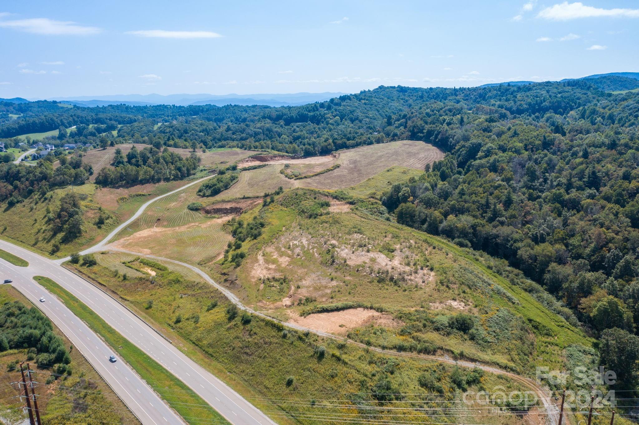 421 US Highway 421 None, Unit NONE Boone, NC 28607 - Photo 10 of 27 a view of a mountain from a balcony