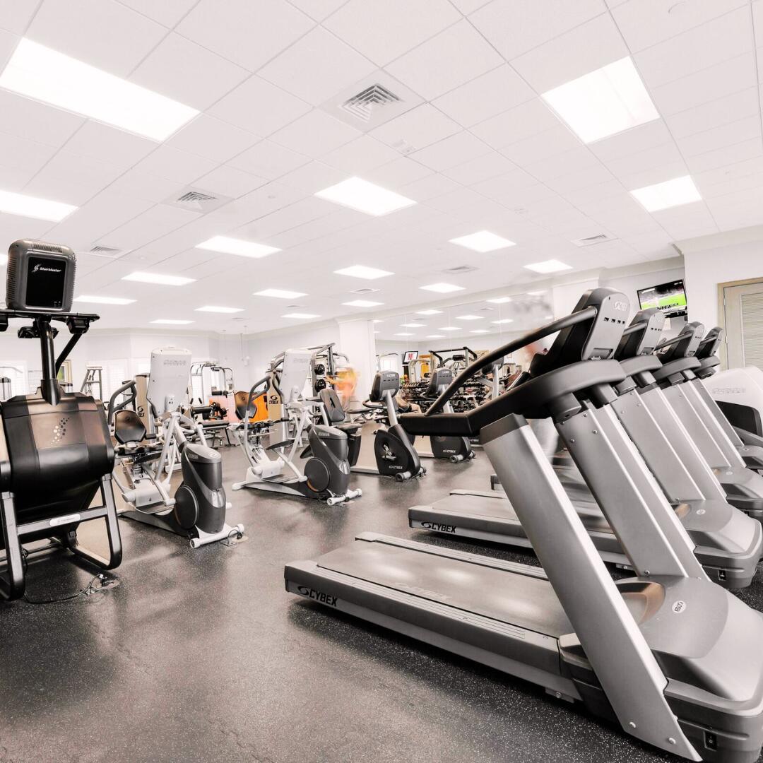 2650 Lake Shore Drive, Unit 1705 Riviera Beach, FL 33404 - Photo 33 of 35 a view of gym equipment and living room view