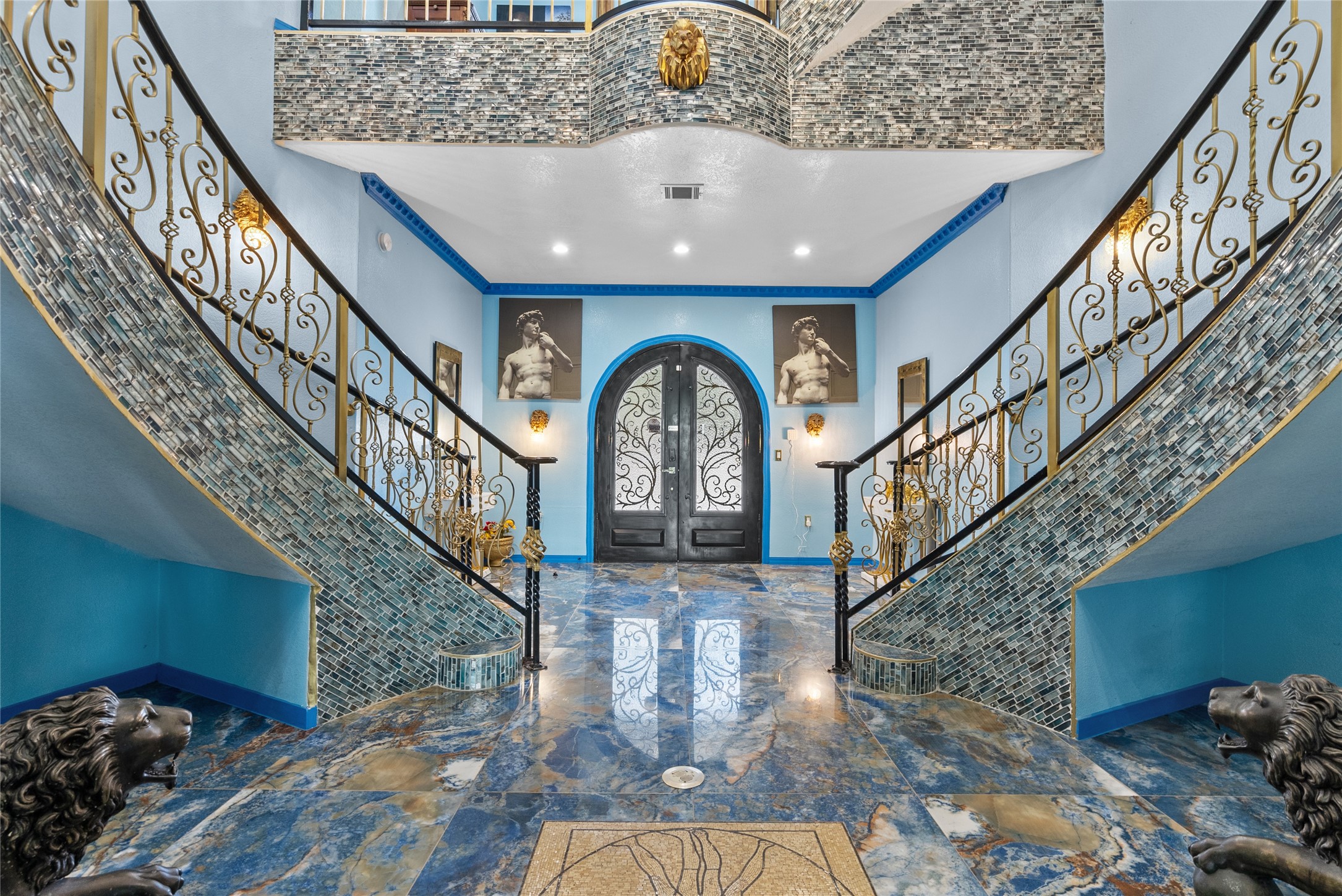 1259 County Road 147 Alvin, TX 77511 - Photo 5 of 49 Entry, with dual staircases, a open foyer, porcelain floors, mosaic like tile trims the staircases.