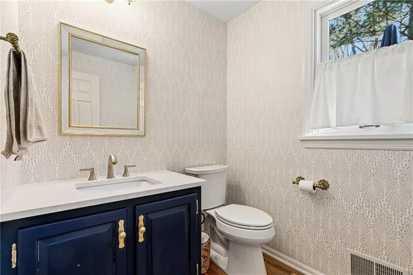 a bathroom with a sink and a toilet