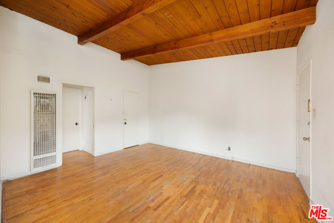 2922 2nd Street Santa Monica, CA 90405 - Photo 6 of 16 a bedroom with a bed and a window