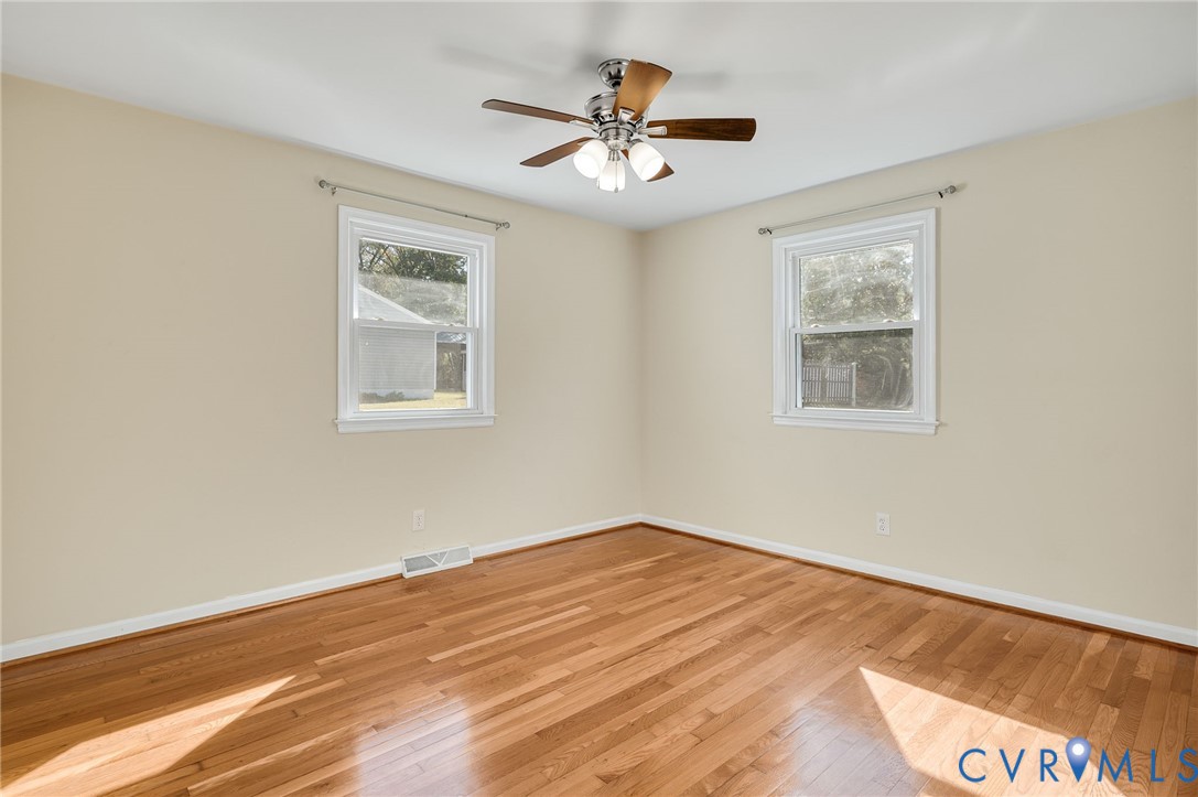 19011 Matoaca Road Petersburg, VA 23803 - Photo 22 of 44 a view of empty room with wooden floor