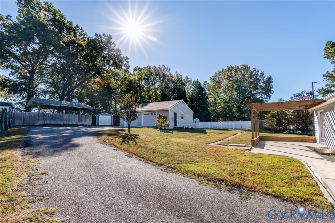 19011 Matoaca Road Petersburg, VA 23803 - Photo 29 of 44 a swimming pool with an outdoor space and seating area