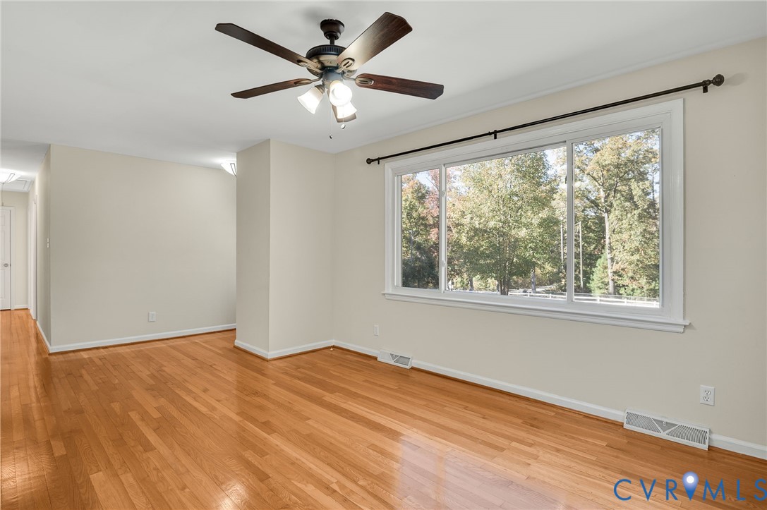 19011 Matoaca Road Petersburg, VA 23803 - Photo 4 of 44 a view of an empty room with a window