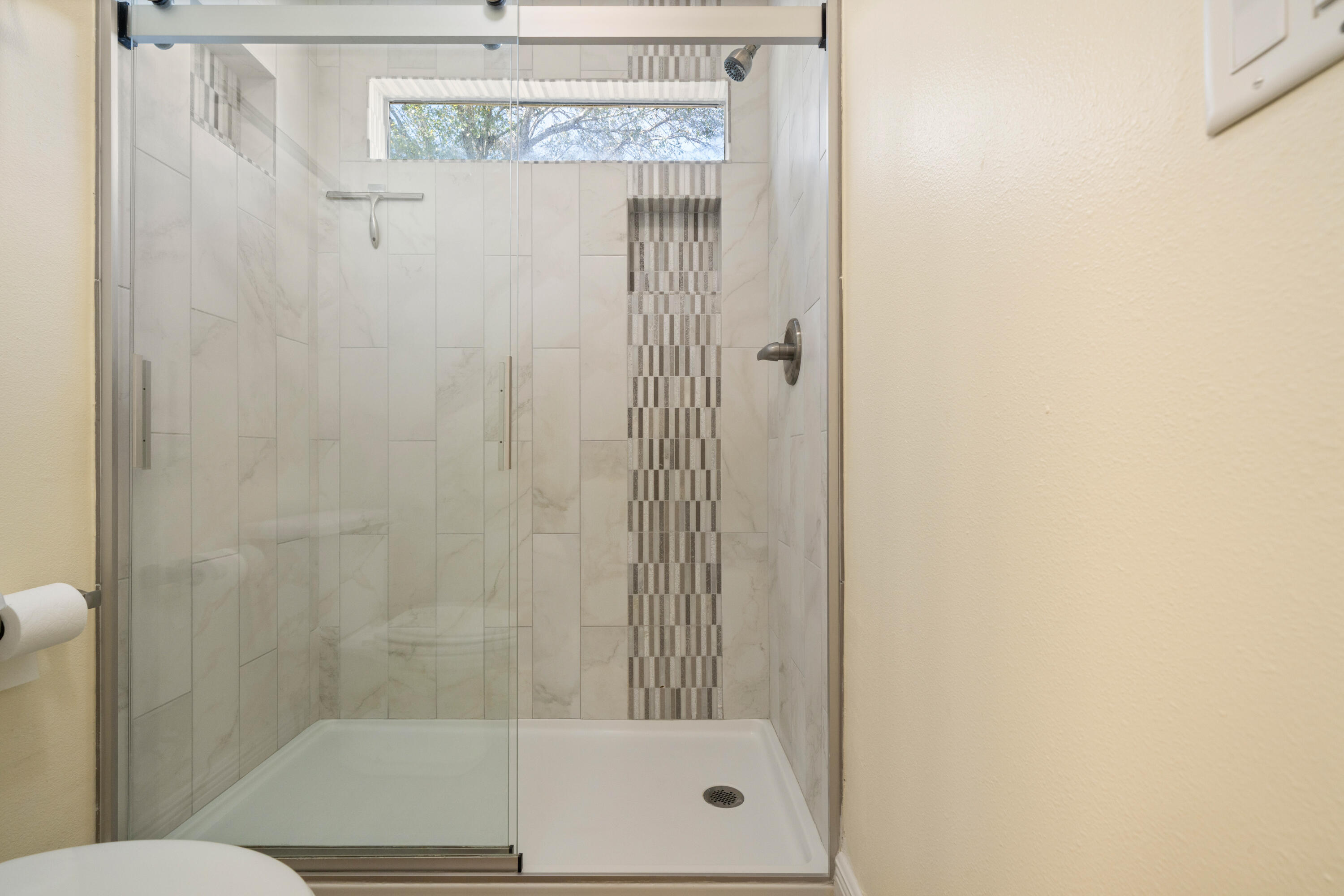 235 Pelican Place, Unit 3 Destin, FL 32541 - Photo 15 of 32 a bathroom with a shower