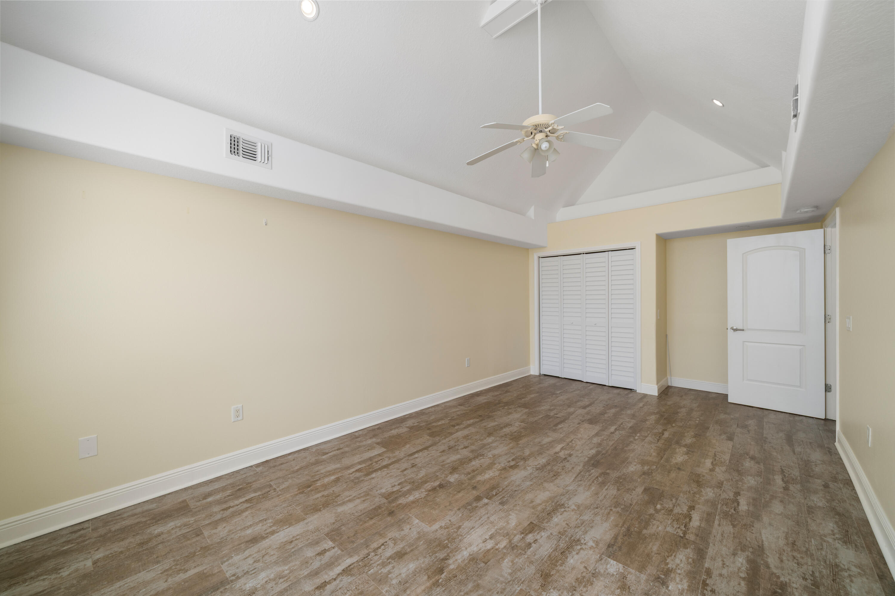 235 Pelican Place, Unit 3 Destin, FL 32541 - Photo 24 of 32 wooden floor in an empty room