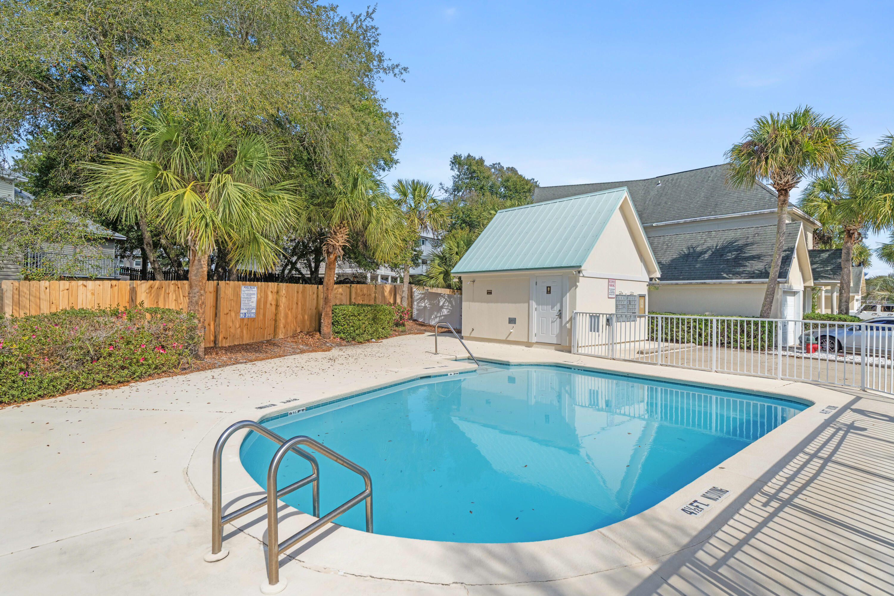 235 Pelican Place, Unit 3 Destin, FL 32541 - Photo 28 of 32 swimming pool view with a seating space