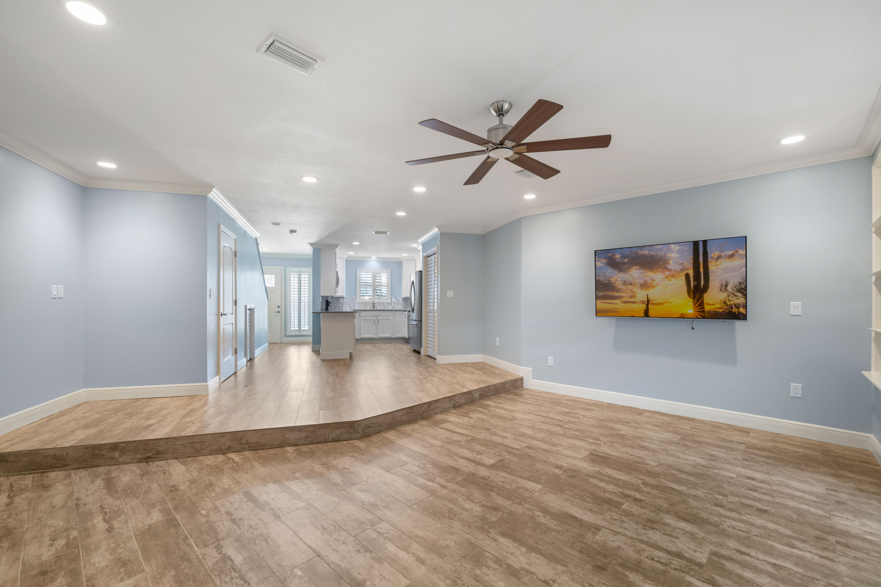 235 Pelican Place, Unit 3 Destin, FL 32541 - Photo 8 of 32 a view of a livingroom with a flat screen tv